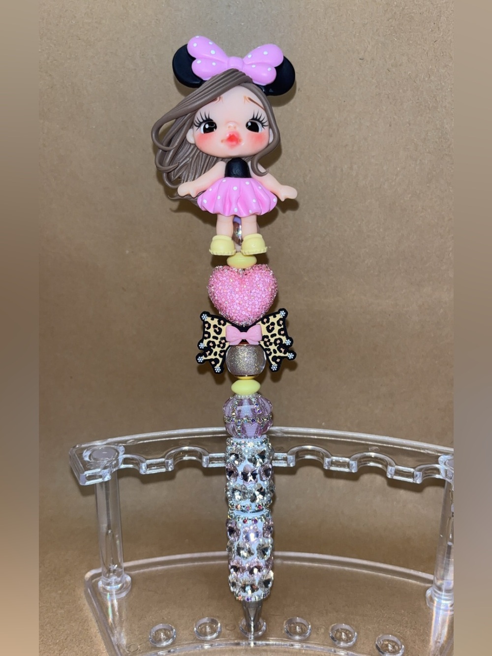 Minnie girl clay doll pen